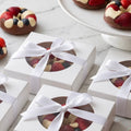 Individually packaged chocolate-covered fruit event favour